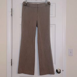 Light tan/neutral pants 2 clasp closure. Excellent condition.  Buckle accents